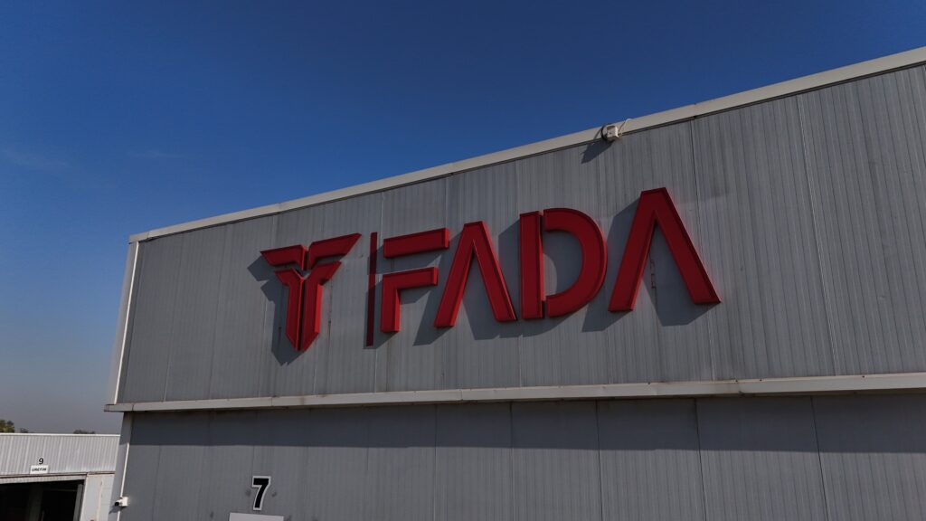 FADA visit with Farley - FADA logo on headquarters